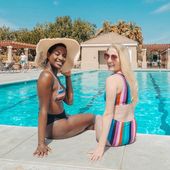 Family in a Swimming Pool at Sanford Landing Apartments, Sanford, Florida