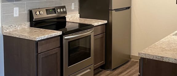Kitchen at Whispering Pines Apartments in Holland, Michigan