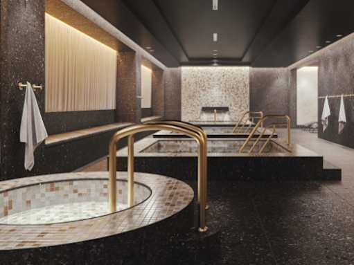 A luxurious bathroom with a large circular tub in the center.
