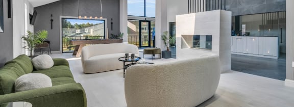 a room with a couch and two chairs at Townhomes at Gateway, Bensalem, Pennsylvania