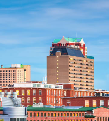 a view of the boston skyline from across the water