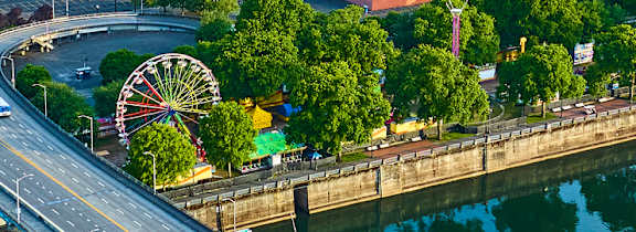 A cityscape with a river running through it.