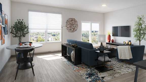 A modern living room with a large window and a view of the city.