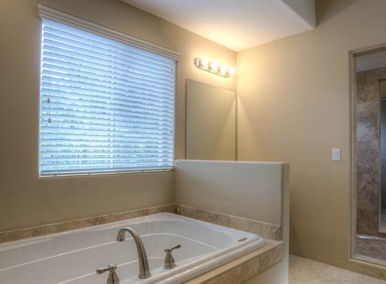 Apartment bathroom — representative home at Monterosa Villas.