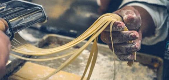 a person is holding a bunch of wires