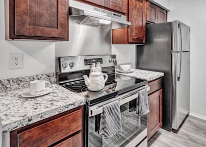 the kitchen of our studio apartment atrium with stainless steel appliances