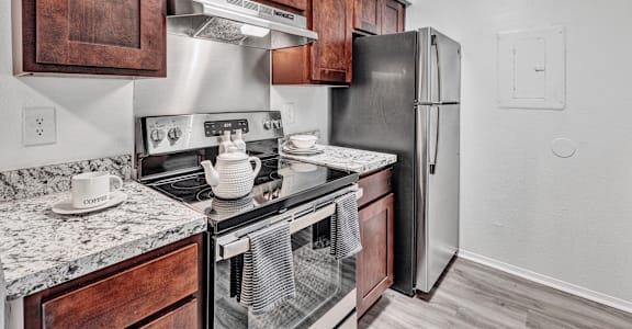the kitchen of our studio apartment atrium with stainless steel appliances