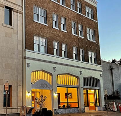 The exterior of the historic Storonia City Hall building is shown.