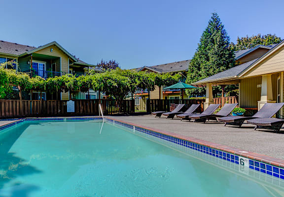 Shimmering pool at Commons at Hawthorn Village Apartments, Hillsboro, OR, 97124
