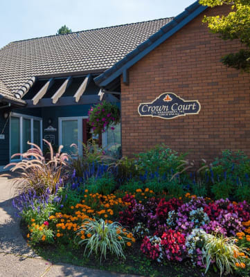 Crown Court Clubhouse Exterior Entry & Floral Landscaping