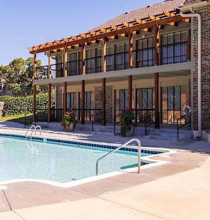 Swimming pool area at Regent’s Walk Apartment Homes for relaxation and leisure use