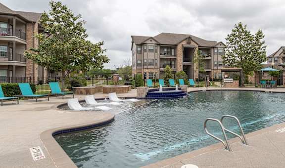 the preserve at ballantyne commons community swimming pool with apartment buildings