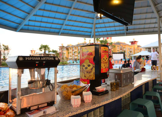 Apartments for Rent Lewisville, TX - Hebron 121 Station - Poolside Bar with Popcorn, and Nachos.