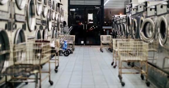 a laundromat with a bunch of washing machines