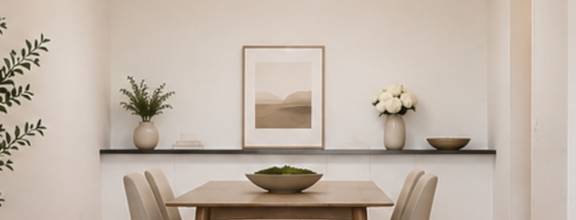 A modern dining room with a wooden table and chairs.