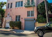 Thumbnail 6 of 6 - Main entrance exterior with parking garage