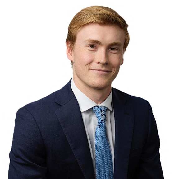 a young man in a suit and tie