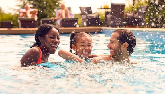 Swimming family at Aria Landings, Fort Myers, FL