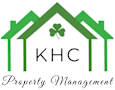 A logo for KHC Property Management featuring a green house with a four-leaf clover in the center.