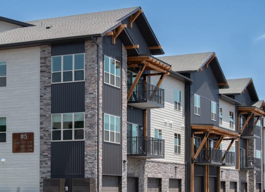 a new apartment building with balconies at The Crossings  at Windsong, Prescott Valley, AZ
