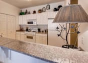 Thumbnail 6 of 25 - granite breakfast bar at The Sanctuary of Lake Villa, Lake Villa