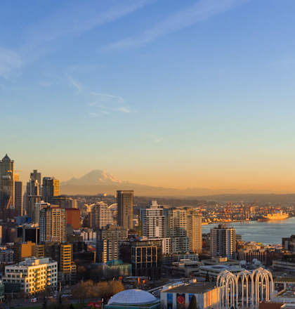 a view of the space needle and the city at sunset at Junction Central, Washington, 98116