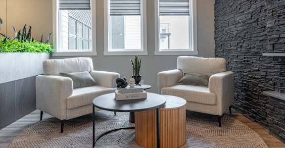 Living Room Sofa Chairs at Vista Apartments at Edgemont, Alberta, T6M 1J4