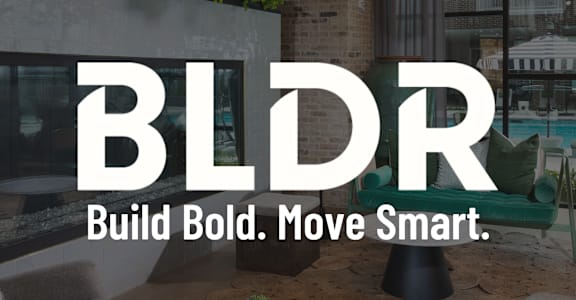 a large chess board in front of a fireplace