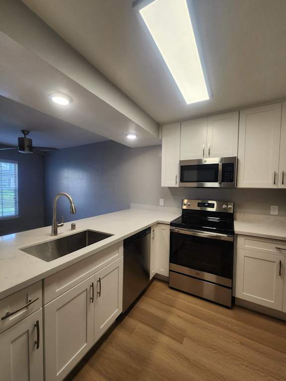 a view of the kitchen from the loft