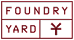 A red sign with the words "Foundry Yard" and a symbol.