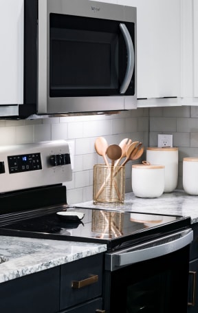 close up of stove and microwave