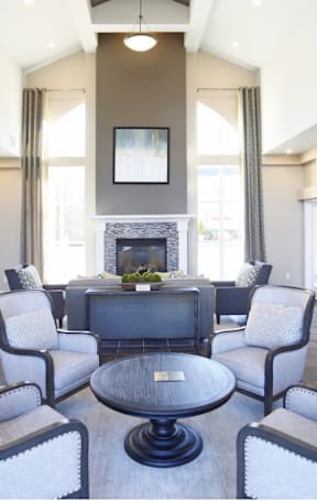 a living room and dining room with a couch and a table