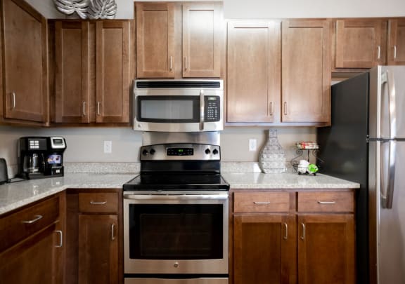 Kitchen with Stainless Steel Appliances located at Hall Creek Apts in Arlington, TN 38002