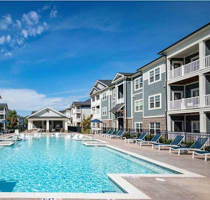 A large swimming pool in front of apartment at Waterleaf at Neely Ferry Apartments, Simpsonville, SC