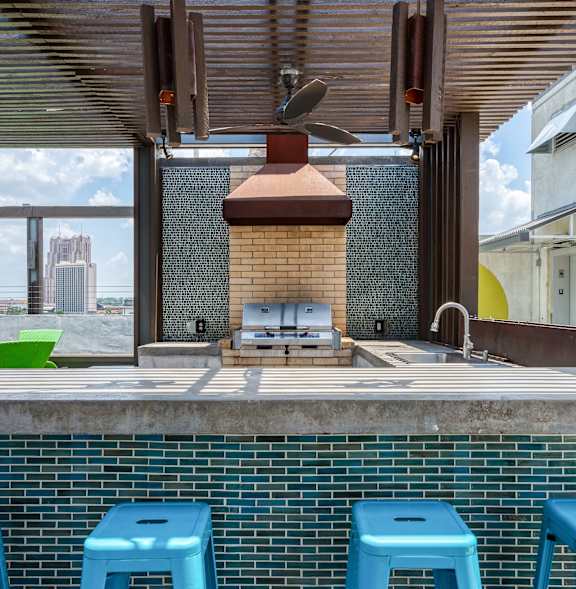 Kitchen with blue stools at Agave, San Antonio, Texas