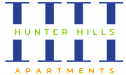 The image is a logo for Hunter Hills Apartments.