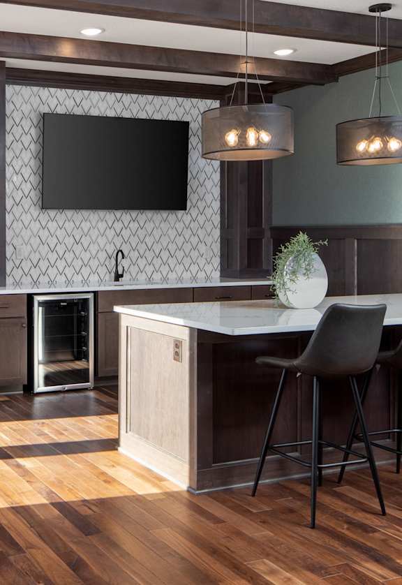 a large kitchen and dining room with a table and chairs