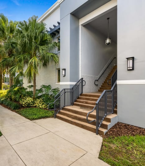 the preserve at ballantyne commons apartments entrance with stairs and palm trees