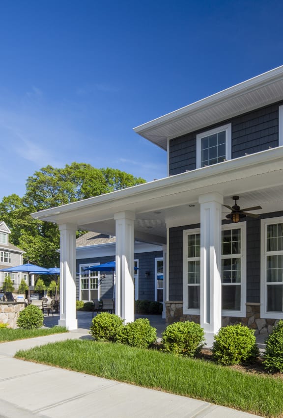 a picture of the front of a building with a blue sky in the background at Merion Stratford Apartment Homes, Stratford