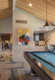 The Icon on Central Apartments in Phoenix, Arizona Upstairs clubhouse and game room with pool table