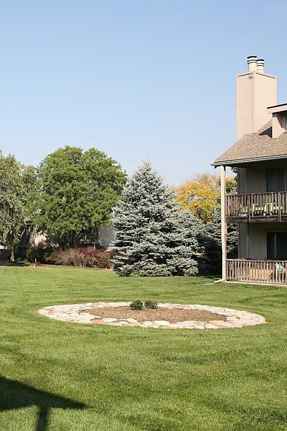 A scenic view of the Eden West Complex, highlighting the buildings and lush green surroundings.