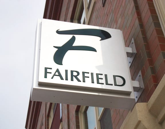 The exterior signage at Fairfield apartments and townhomes in Pittsburgh, PA