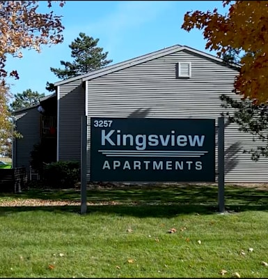 the building where the apartment is located has a sign
