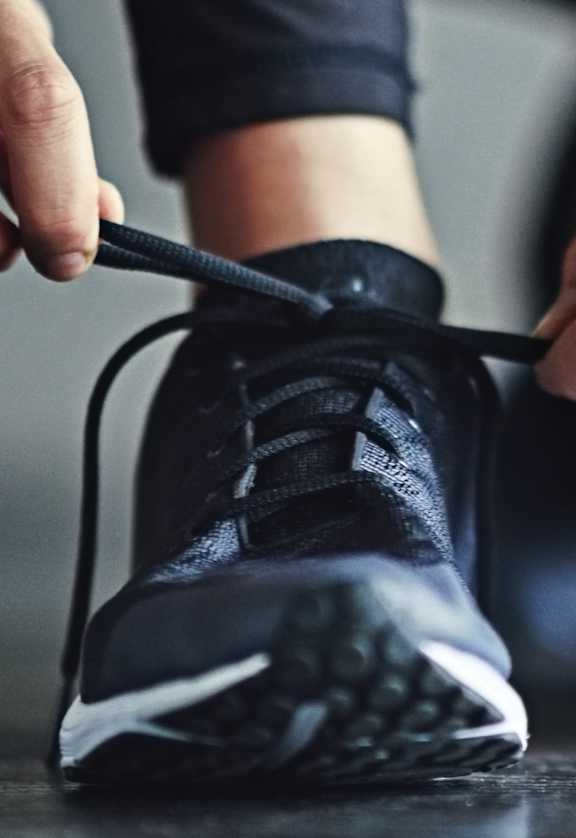 Tying Up Running Shoes at 1038 on Second Apartments in Lafayette, CA 94549