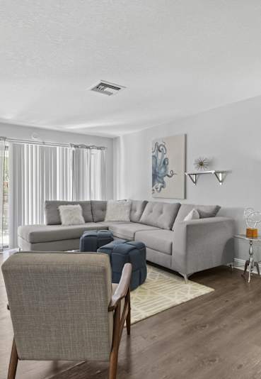 Fitness center with cardio and strength equipment at Belara Lakes Apartments