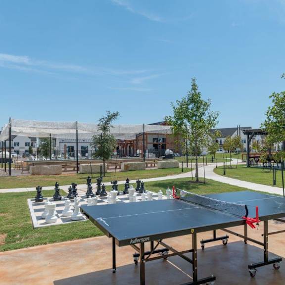 Our luxury apartment community in Leander offers a pergola lounge with string lights for parties and gatherings.