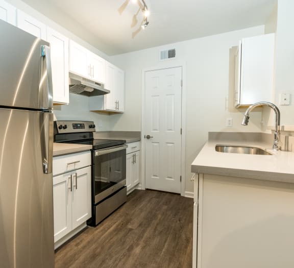 Kitchen with stainless steel appliances at Monterey Ranch, Austin, Texas