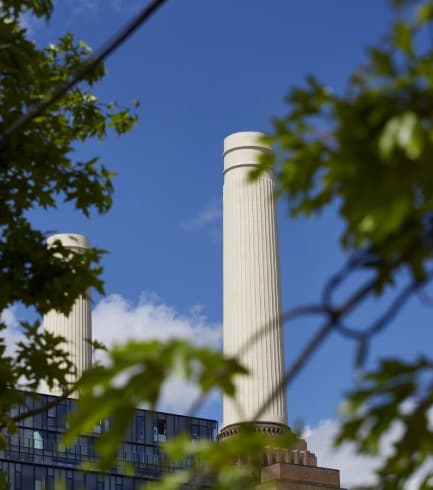 a large building with columns in the sky