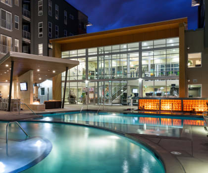 Veranda Highpointe Apartments Pool Area and Building at Night