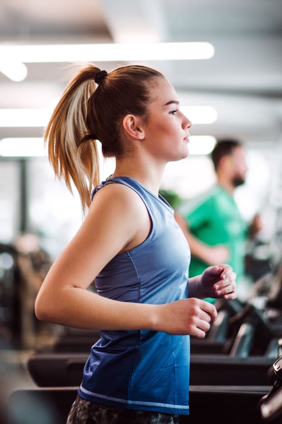 Woman on a treadmill exercising